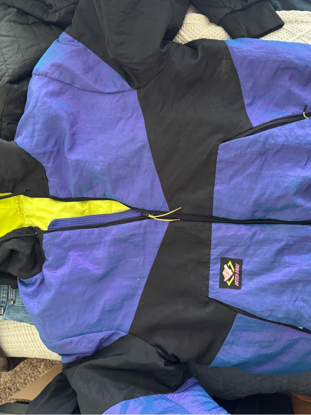 Dutch Bros Black and Purple Puffer Jacket with Neon Yellow Lining